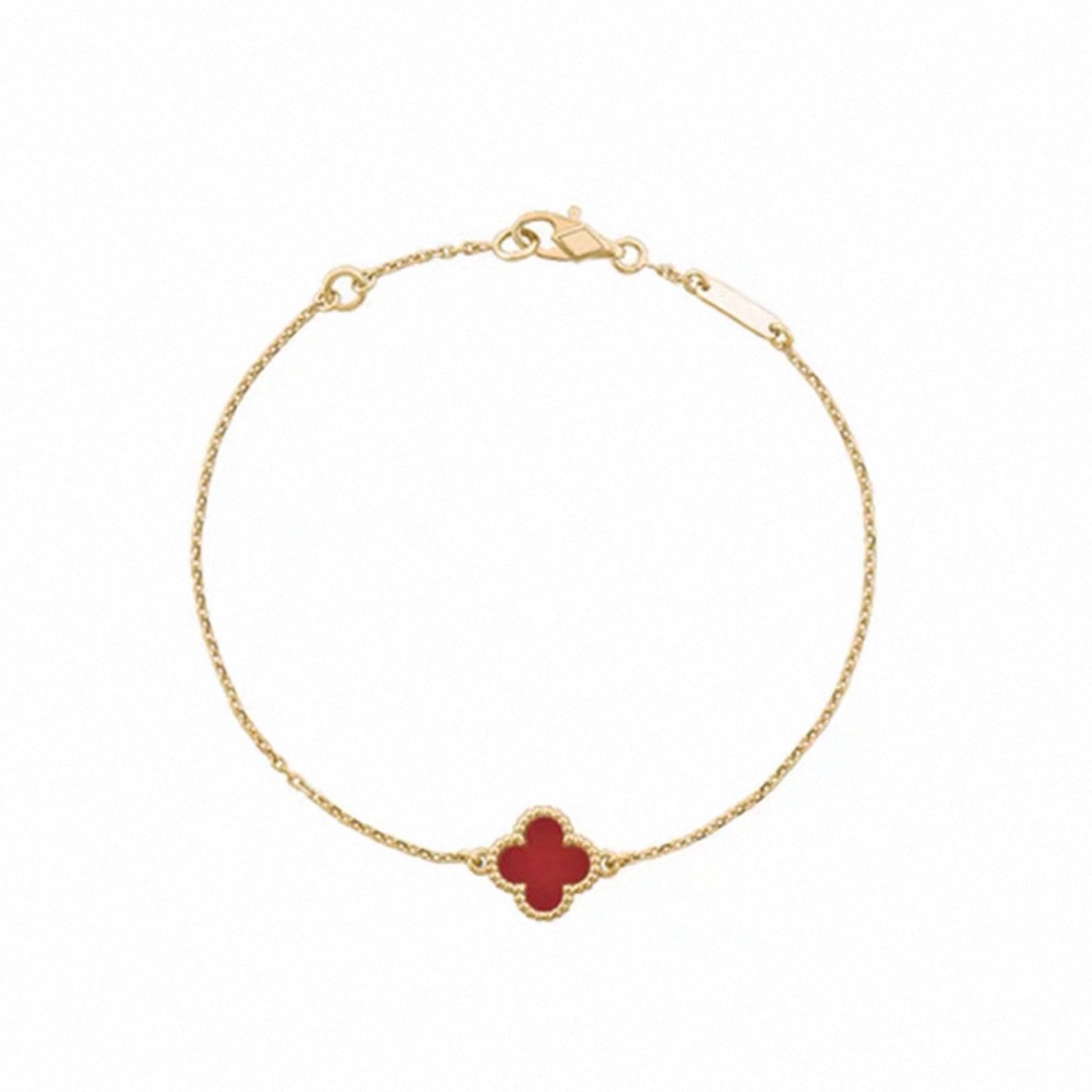 Van Cleef & Arpels Gold Bracelet with Red Clover Accent